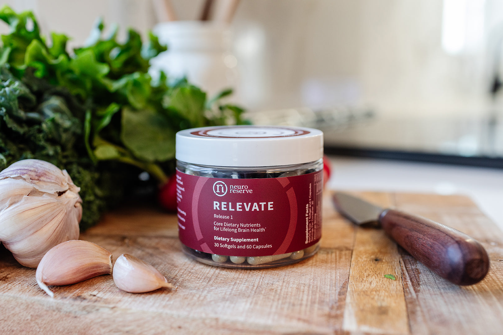 Close-up photo of RELEVATE Brain Health Supplement on cutting board 
